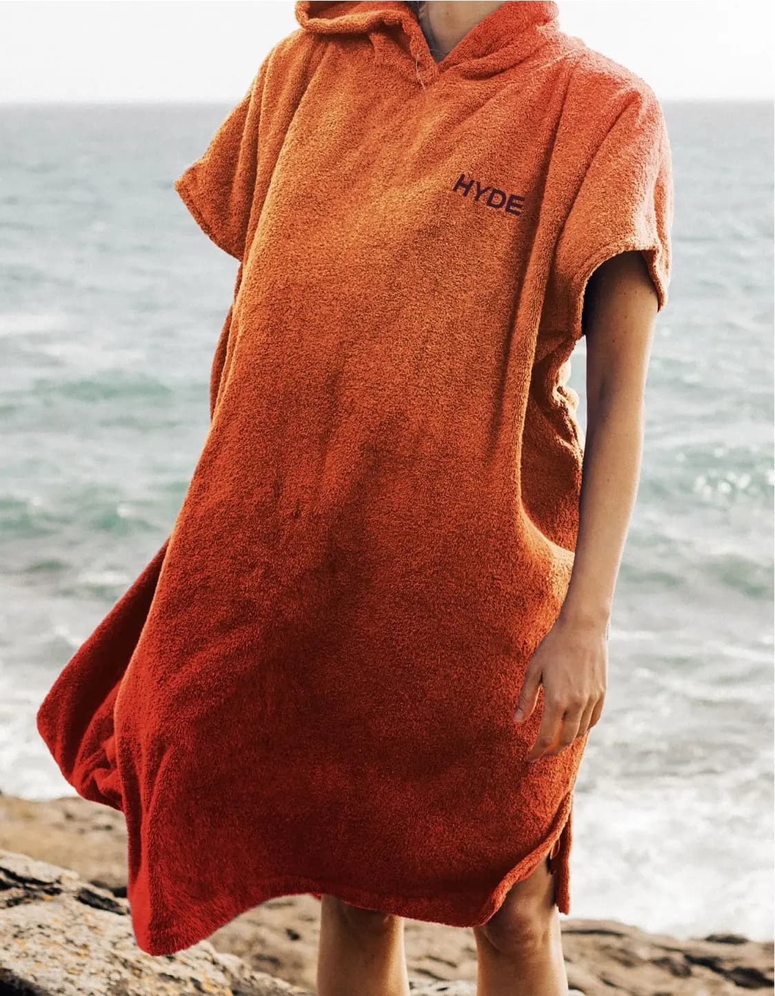 Hyde branded beach towel by the sea