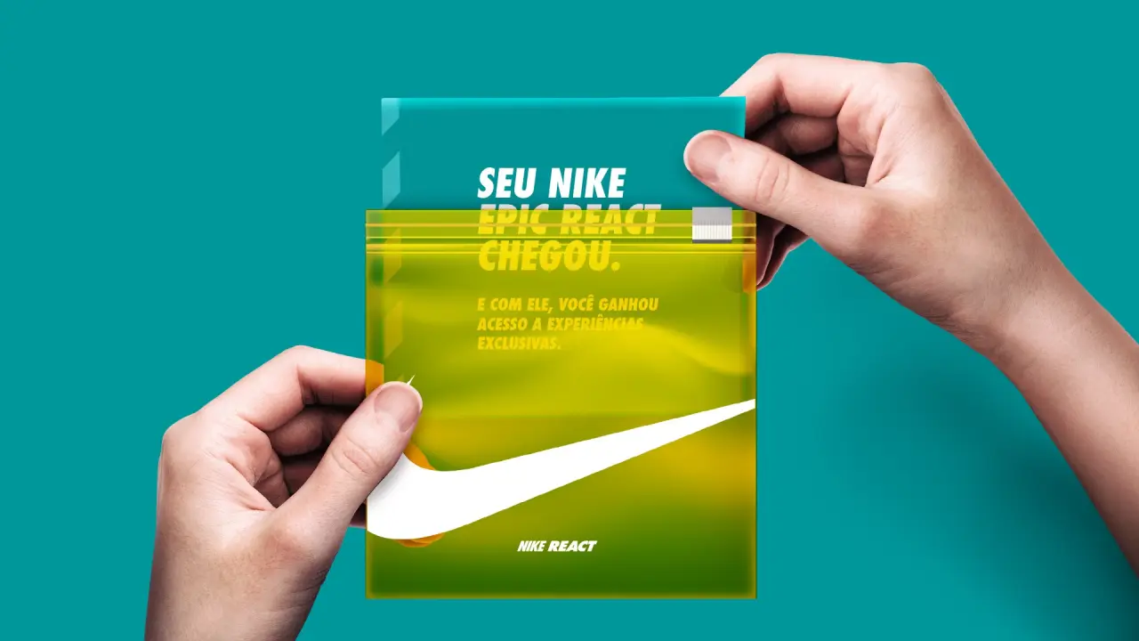 Nike Epic React translucent launch packaging held in hand